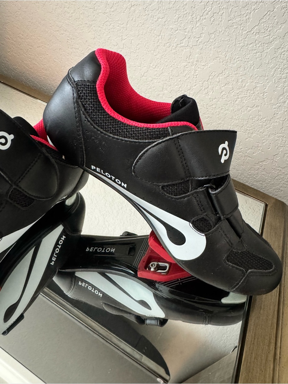 Peloton women’s Black Cycling Shoes with White Swoosh and Red Lining